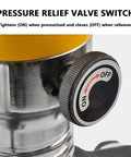 Close-up of pressure relief valve switch on Heavy Duty 2 Or 3 Jaw Hydraulic Gear Puller Kit featuring adjustable grippers.