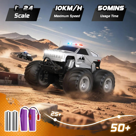 Silver All Terrain Remote Control Truck Beast with 360 Degree Spins and Lights racing in desert terrain, focus on pickup style.