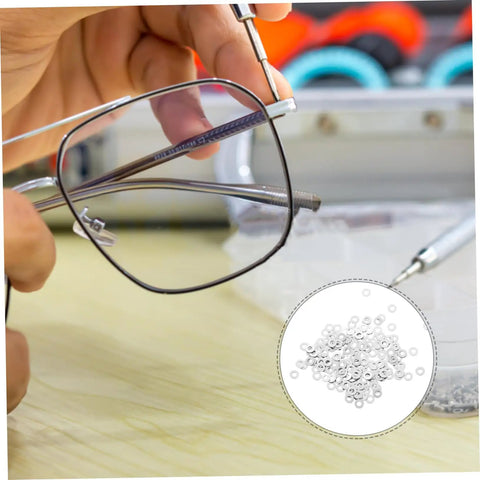 Person repairing rimless glasses with Metal Eyeglass Frame Washers 200 Pcs Set for Rimless Glasses, Quick Fix Repair Accessories.