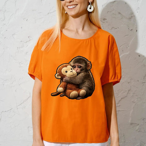 Woman wearing Cute Monkey Punchs Meme DTF Transfers Pack for T Shirts Ready To Press Heat Transfer Vinyl Stickers 7x7 washable decals.