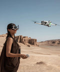 Person flying 8K 360 Drone Explorer Bundle With Invisible 360 Capture And No Guardrails For Unreal Creative Freedom in desert landscape