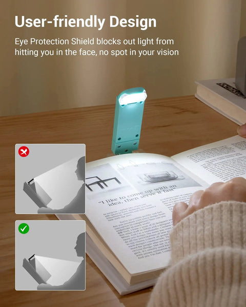 USB Rechargeable Clip On Book Light For Late Night Reading With Eye Care Glow illuminating a book page at night.