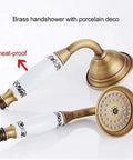 UBNMIUBV Shower System, Antique Brass Shower Faucets Set with porcelain deco handshower and heat-proof handle.