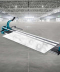 Manual tile cutter with teal frame and long rails, 48-inch capacity, cutting a white veined tile.