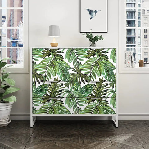 Tropical Peel And Stick Wallpaper Jungle Palm Leaf Green Vinyl Wall Covering on cabinet in modern living room setting.