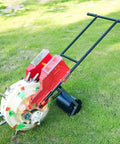 Walk Behind Seed Planter With Integrated Fertilizer Applicator Six Hole Row Crop Seeder for efficient planting on grass