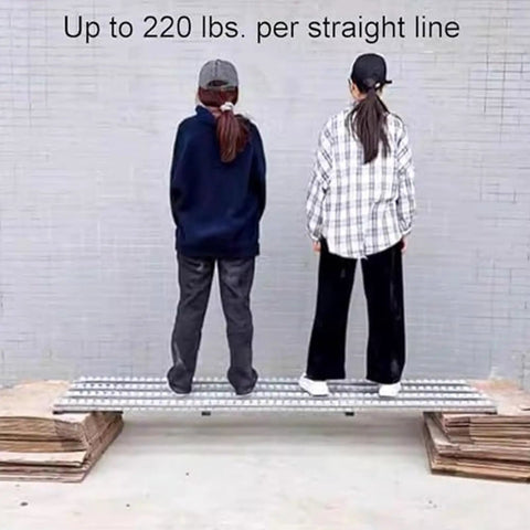Two people standing on Ultra Portable Conveyor Belt System With Lightweight Modular Rollers demonstrating durability up to 220 lbs.