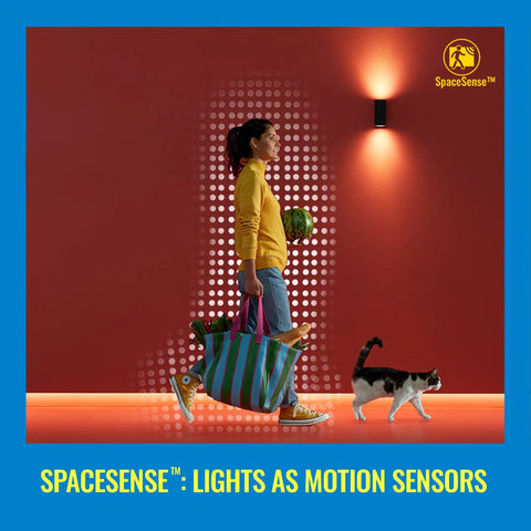 Woman walking past motion-activated Smart Outdoor LED Porch Light With 16 Million Colors, No Hub Needed, Works With Alexa And Google Assistant