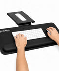 Smooth Glide Under Desk Keyboard Tray Featuring Adjustable Tilt And Height Controls 25 X 10 Inch with wrist rest and keyboard.