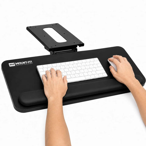 Smooth Glide Under Desk Keyboard Tray Featuring Adjustable Tilt And Height Controls 25 X 10 Inch with wrist rest and keyboard.