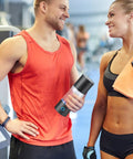 Man holding Hydrogen Water Bottle Generator With SPE Technology On The Go Portable 230 Milliliter Capacity in gym