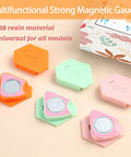 Front view of three hexagonal magnetic seam guides for sewing machines in orange, mint green, and pink with visible magnets