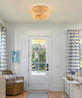 Interior view showing Natural Rattan Flush Mount Ceiling Light Fixture In Antique Brass Brush Finish in a living room.