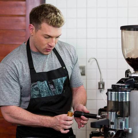 Barista using Two Pack Espresso Distribution Tool Set with Walnut and Rosewood Wood Handle Five Needle Espresso Stirrers