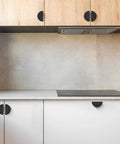 Matte Black Cabinet Pulls 3 Inch Center To Center 2 Pack for kitchen cabinets on wooden and white cabinetry.
