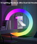 Compact Portable Personal Cooling Fan With Remote Control, Mini AC on desk with colorful lighting in a dark room