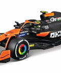 McLaren MCL38 1:43 Scale 2024 Die-Cast Formula Car With Helmet Display Box And Norris Number Four Lando Norris Collectible Model