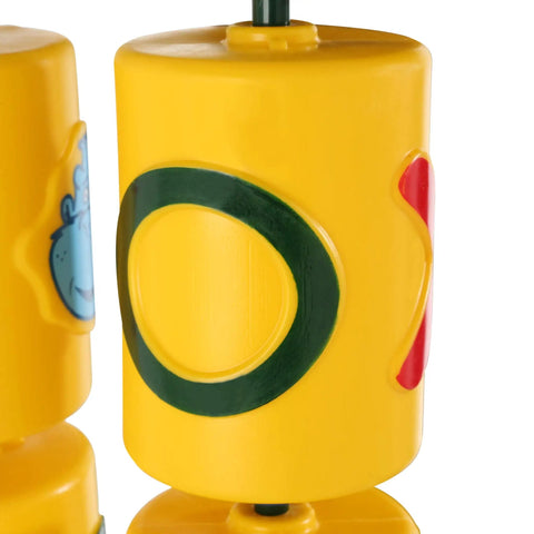 Close-up of yellow plastic Tic Tac Toe Spinner Activity Panel for Swing Sets with green and red decals, backyard play accessory