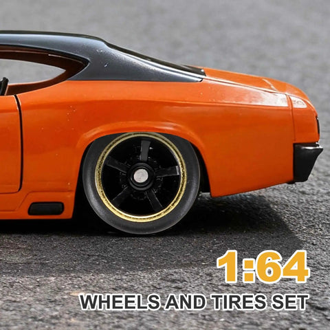 Close-up of an orange diecast car featuring 1/64 scale black 10-spoke gold line rims from Four Pack 1/64 Scale Wheels And Tires Set With Real Riders Rims Axles Included For RC Diecast Cars And DIY Models 10 Spoke Gold Line Black Rims For Custom Builds And Upgrades.