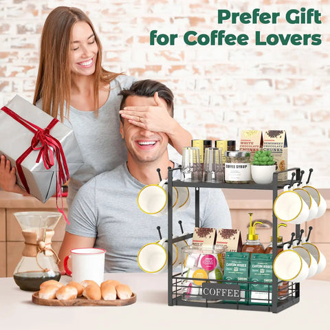 Coffee Mug Organizer Rack For Countertop, 2 Tier Mug Stand With 12 Hooks in kitchen setting, next to coffee and pastries.