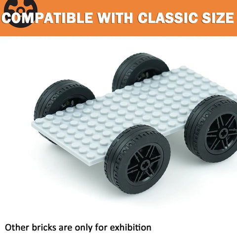 Four Piece Tech Wheels And Tires Set With 43.2x14mm Tires And 30x14mm Rims display on grey base for RC toy cars