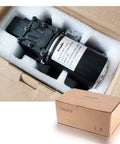 12V Diaphragm Water Pump 1.5 GPM at 100 PSI Self Priming DC Fresh Water Pump for RVs in packaging with hose clamps visible