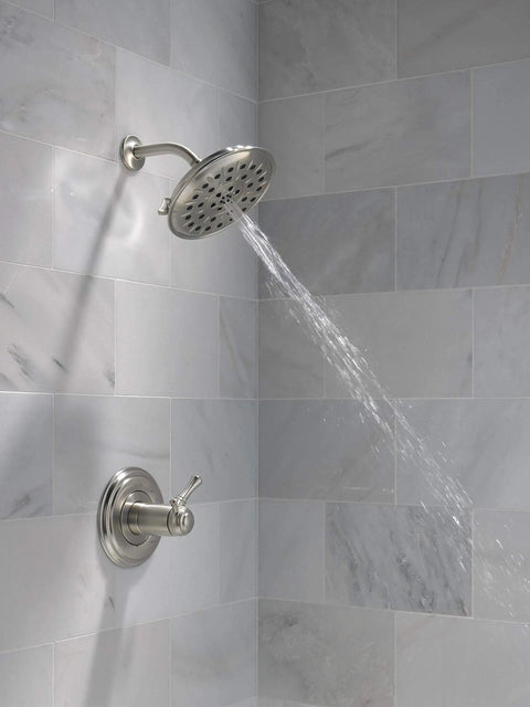 Brushed Nickel Four Setting Shower Head With H2Okinetic Spray Four Inch Round Design One Point Seven Five GPM Water Saving Flow Stainless
