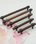 Walnut Wood Cabinet Pull Handle With Black Finish, various sizes, sturdy wood and zinc alloy knob, on floral backdrop