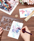 Smooth Operator Acrylic Router Template Set With Killer Butterfly Stencil For Precision Woodworking Projects shown with a hand tracing a butterfly.