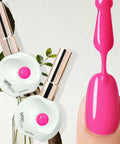 Pink nail polish from 12ml Nail Gel Kit With UV Gel Polish Colors Long Lasting, Salon Quality For DIY At Home Nail Art Cures Under UV LED Lamp HEMA TPO Free Glossy Finish Easy Application For A Pro Look applied to nail.