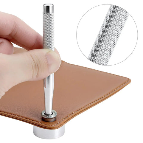 Using Heavy Duty Hole Punch Set 11 Piece Carbon Steel Punch And Rivet Tool Kit to punch leather, showing hand holding tool