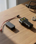 Premium Electric Rc Winch For 10 Scale Crawlers With Smooth Spool Function and sturdy metal build components on a wooden surface.