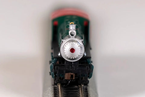 Front view of USRA 0-6-0 Switcher Locomotive With Die Cast Chassis And Metal Handrails Skew Wound Motor Engine And Tender Electrical Pickup Traction Tires N Scale Christmas Edition Prototypical 0-6-0 On 11.25 Inch Radius Curves