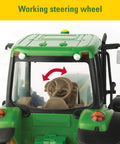 Close-up of the 1/16 Scale Farm Tractor With Wagon Toy For Kids showing functional steering wheel in green cabin.