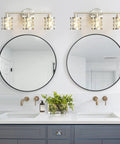 Bathroom with Three Light Brushed Nickel Vanity Light Fixture With Cylinder Crystal Shades Over Mirror Slick Modern Wall Sconce