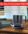 Electric Smart Coffee Mug With Led Display And Precise Temperature Control Keeps Your Daily Grinds Piping Hot Auto Shut Off Feature Three Custom Heat Settings For Flawless Sips Everywhere on a desk with three heat settings displayed.