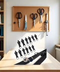 12 Pack Black Zipper Pulls Replacement Kit Universal Zip Slider Teeth Zippers Quick Fix For Jackets And Garments Durable Rust Proof Easy Install displayed on sewing table in craft room.