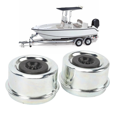 2.44 Inch OD Trailer Axle Dust Cap Kit With Two Rubber Plugs And Bearing Grease Caps For Boat Trailer Wheel Hub 5200 And 6000 Lb Axles Heavy Duty Galvanized Steel Rust Resistant Seals shown with boat trailer in background.