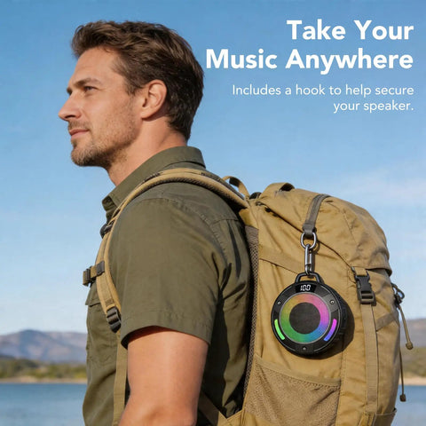 Man hiking with Dope Portable Wireless Shower Speaker With Digital Display And Detachable Hook IPX7 Waterproof LED Light on backpack