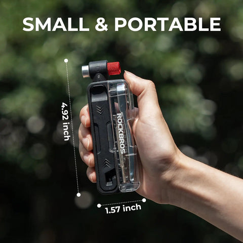 Hand holding Portable Bike Multitool With 7 Magnetic Bits, Ratchet Wrench And CO2 Inflator Nozzle, showing compact size