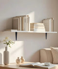 Hella Sturdy 8 Pack Black Metal L Shelf Brackets Heavy Duty Wall Mount Floating Shelf Supports Thick Steel L Brackets on white shelf.