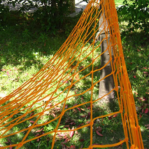 Outdoor Nylon Rope Hammock Swing With Mesh Seat in vibrant orange, strung between trees, showing durable nylon mesh with breathable design.