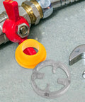 Lightweight Plastic Threader Kit For Pvc Pipe Threading Compatible With Manual And Electric Drill with NPT die adapters on work surface.