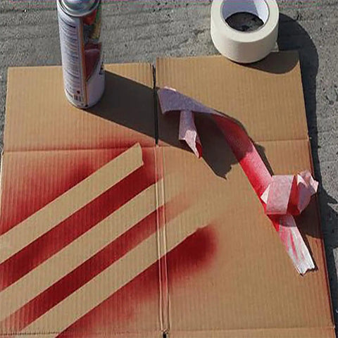 Cardboard with spray paint lines and Masking Tape 1 Inch By 55 Yards Bulk Pack Of 12 Rolls For Paint Prep And General Purpose Use Crepe Paper Adhesive Tape Removable Without Residue Easy Cleanup 660 Yards Total Budget Friendly