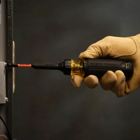 Hand using 15-In-1 Multi-Bit Ratcheting Screwdriver Set With Impact-Rated Bits, 7 ProFlex Double-Ended Tips, 1/4-Inch Nut Driver