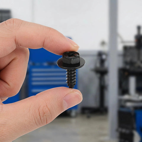 100 Piece Car Body Screw Kit With Integrated Flange Head For Wheel Well Liner And Bumper Cover, Vibration Resistant Auto Body Fasteners, Stable Thread Forming For Easy Disassembly And Reassembly For Your Daily Driver close-up black flange-head screw held by hand
