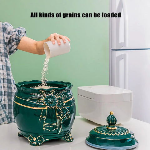 Durable Ceramic Rice Jar And Large Tea Storage Container With Massive Capacity For Keeping Coffee Beans Grain Flour And Cereal Fresh While Dropping Clean Looks On Your Counter, shown with grains being poured.