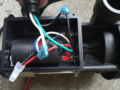 Internal wiring of Rock Solid Hot Tub Bath Replacement Pump, showing copper winding LX motor connections for spa systems.