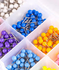Kickass Bulk Supply Of 600 Heavy Duty Map Tack Push Pins Featuring Smooth Plastic Bead Heads And Vibrant Assorted Colors For Bulletin Boards And Classroom Organization in organized compartments.