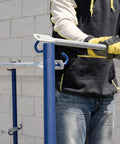 Heavy Duty Scaffold Guardrail System 5 Feet Wide 7 Feet Deep Built Like A Tank Jobsite Fall Protection Kit with worker using wedge clamps.